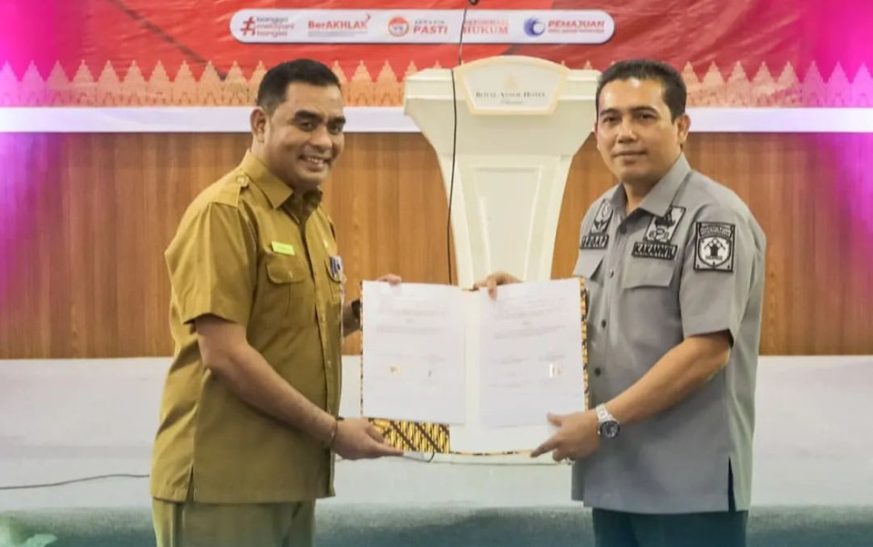 Komitmen Tingkatkan Pelayanan, DPMPTSP Pekanbaru Tandatangani PKS Dengan Kemenkumham Riau