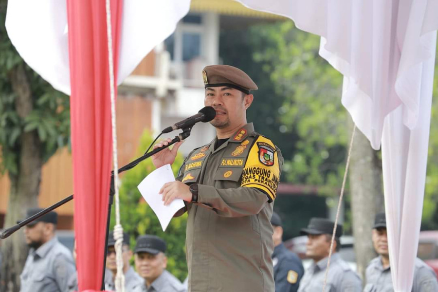 Pj Walikota Pekanbaru Pimpinan Apel Besar Satpol PP Amankan Pilkada